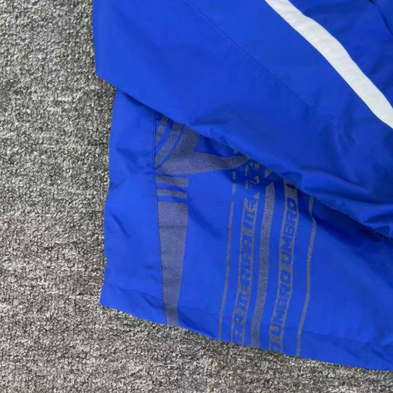 جاكيت رياضي رجالي Y2K أزرق مخط - مراجعة Vintage Windbreaker Nylon وسعره